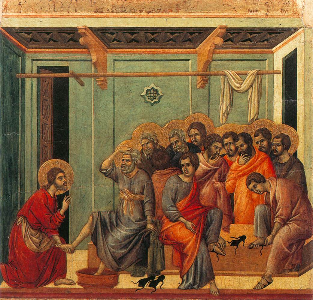 Image of Jesus washing the feet of the 12 disciples.